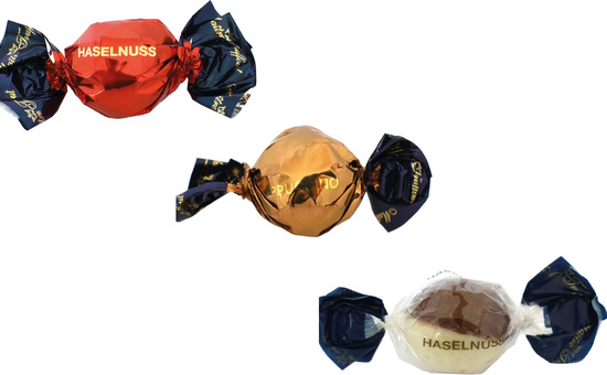 Weihnachtspralinés in Motivkartonage "Tannenbaum", Inhalt: Pralinen Milchschokolade mit Haselnusscremefüllung ca. 120 g